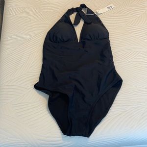 Black bathing suit, one piece, with open back